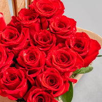 Arreglo de 12 Mayordomos RD 4,950 Rosas Rojas